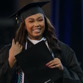 Co-Valedictorian Taylor Dews smiles after her speech  during Spelman’s 2022 Spring Commencement at McCamish Pavilion on Sunday, May 15, 2022. (Natrice Miller / natrice.miller@ajc.com)