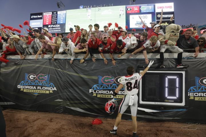 10/30/21 - Jacksonville - Georgia Bulldogs wide receiver Ladd McConkey (84) acknowledges fans after  the annual NCCA  Georgia vs Florida game at TIAA Bank Field in Jacksonville. Georgia won 34-7.  Bob Andres / bandres@ajc.com