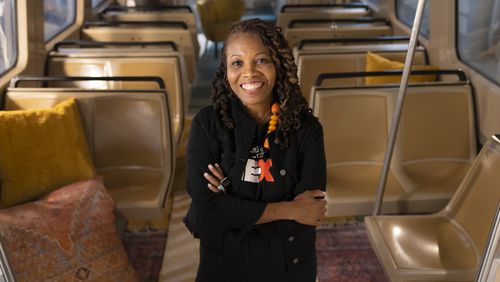 Faith Carmichael, co-founder of the NEXT Movement, pictured on a MARTA railcar. The organizations partnered for the filming "The NEXT Movement, Season One," premiering this month on PBS. (Photo by Terence Rushin)