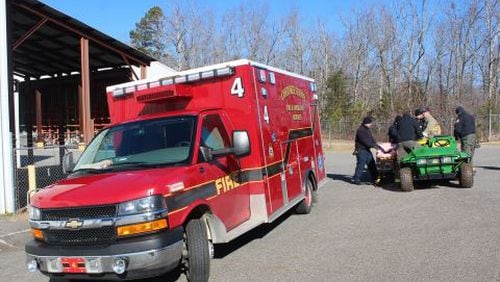 Cherokee County fire officials transport a man who had been missing.