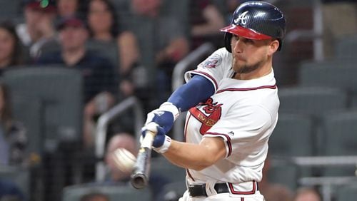The Braves’ Ender Inciarte hits SunTrust Park’s first home run in the sixth inning of Friday’s game against the Padres. HYOSUB SHIN / HSHIN@AJC.COM