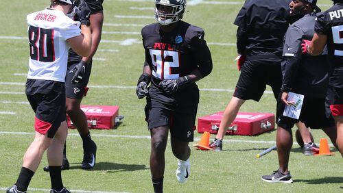 Falcons outside linebacker Ade Ogundeji sprints to the next drill during rookie minicamp in May 2021. (Curtis Compton / Curtis.Compton@ajc.com)