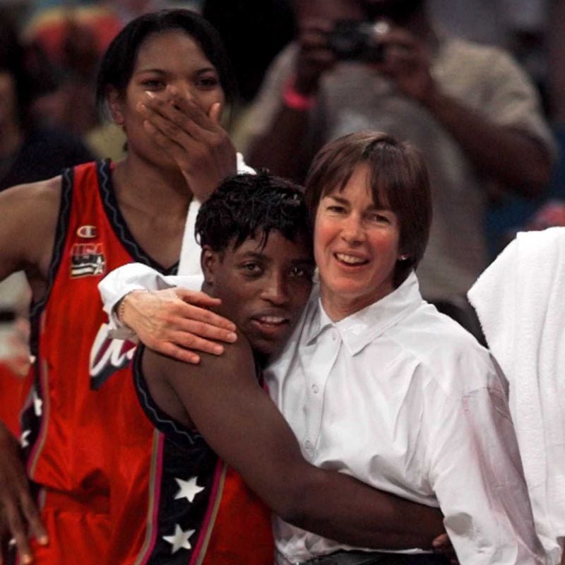 USA women's head coach Tara VanDerveer (right) hugs Ruthie Bolton, as Venus Lacey watches the action on the court during the final moments of the gold medal women's basketball game against Brazil Sunday, Aug. 4, 1996, at the Centennial Summer Olympic Games in Atlanta. US women won. (Eric Draper/AP)