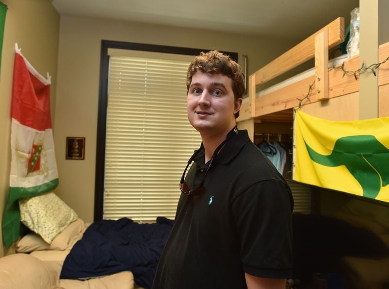 Georgia Tech student Clark Jacobs in his room at the Kappa Sigma fraternity house. Jacobs is back in school after cracking his skull in January 10, 2015 when he fell out of his bunk bed. (BRANT SANDERLIN/BSANDERLIN@AJC.COM)