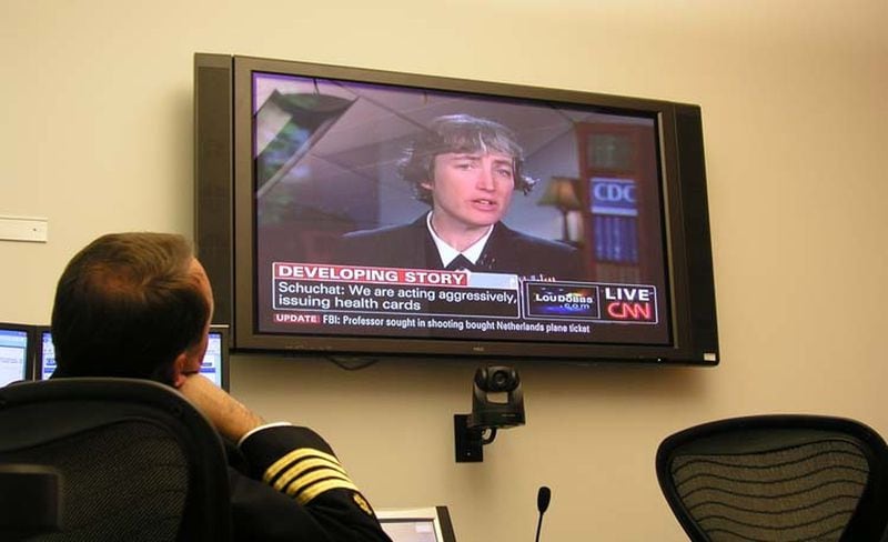 The CDC shined on the world stage during the 2009 H1N1 pandemic. The CDC’s Anne Schuchat gave regular news briefings, updating the nation on evolving scientific research and the search for a vaccine. At the time, she was the CDC’s director of immunization and respiratory disease. She is seen here appearing on CNN, while Daniel Jernigan, leader of the CDC’s Epidemiology and Laboratory Task Force, watches. CDC PHOTO