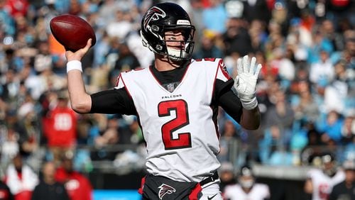 Matt Ryan of the Atlanta Falcons drops back to pass against the Carolina Panthers during their game at Bank of America Stadium on December 23, 2018 in Charlotte, North Carolina. (Photo by Streeter Lecka/Getty Images)