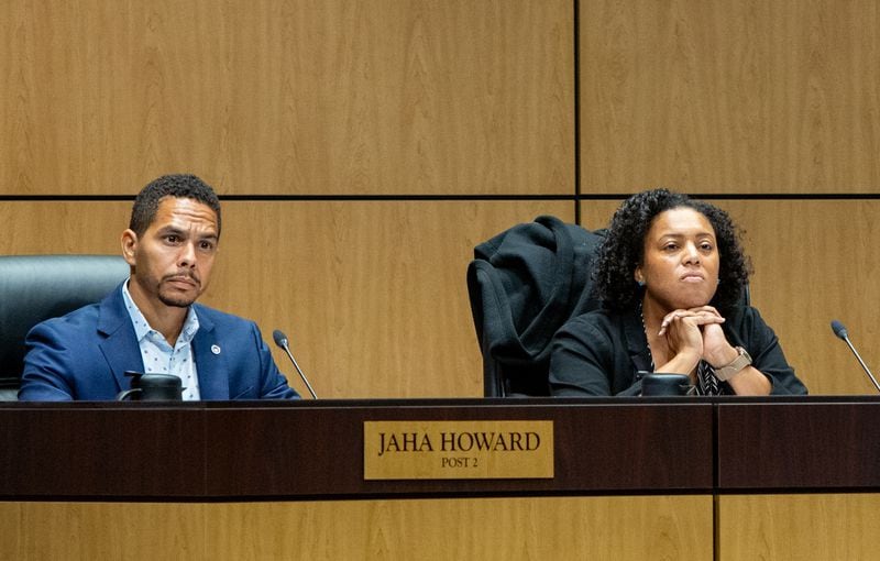 The now-former Cobb County school board members Jaha Howard, left, and Charisse Davis, right, at a Board of Education meeting Thursday, June 9, 2022. (Jenni Girtman for The Atlanta Journal-Constitution)