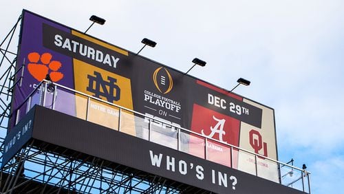 ESPN's billboard in San Jose, Calif., will be home to four rabid college football fans for 12 days.