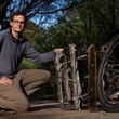 Alex Benigno rides about 10 miles a day on his stand up bike equipped with a homemade trailer covered with magnets that pick up nails, screws and bolts that would otherwise give people flat tires.
