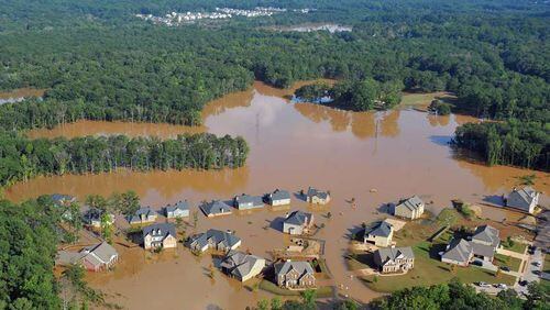 Austell will contribute 5 percent or $120,000 - whichever is lower - toward the $1.2 million cost by the county for a $2.4 million federal study to help control future flooding from the Sweetwater Creek Basin. AJC file photo