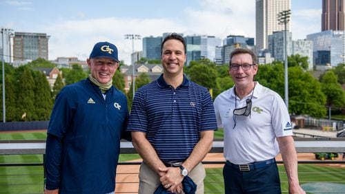 Georgia Tech baseball great and Major League Baseball star Mark Teixeira poses with Tech baseball coach Danny Hall (in uniform) and athletic director Todd Stansbury) at the dedication of the Mac Nease Baseball Park May 24, 2021. A viewing terrace was named in Teixeira's honor for his contributions to the project. (Danny Karnik/Georgia Tech Athletics)