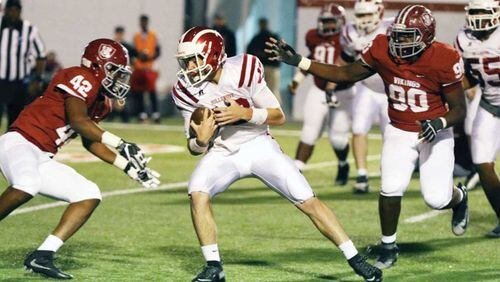 Hillgrove QB Hunter Arters leans in for a touchdown in Friday's game.