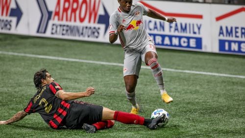 Atlanta United defender Franco Escobar (2) defends against a New York Red Bulls player during the first half in a MLS game at Mercedes-Benz Stadium on Saturday, Oct. 10, 2020, in Atlanta. Branden Camp/For the Atlanta Journal-Constitution
