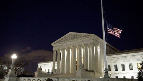 The American flag flies at half mast at the U.S. Supreme Court February 13, 2016 in Washington, DC. Supreme Court Justice Antonin Scalia was at a Texas Ranch Saturday morning when he died at the age of 79. (Photo by Drew Angerer/Getty Images)