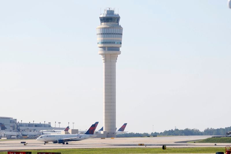 Delta Air Lines planes are seen beside the Hartsfield-Jackson Atlanta International Airport control tower on Thursday, Sep. 7, 2023

Miguel Martinez /miguel.martinezjimenez@ajc.com