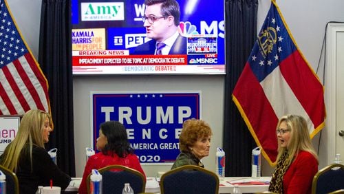 People talk before the start of the Democratic debate at the Cobb County Republican Party Headquarters in Marietta Wednesday, November 20, 2019.   STEVE SCHAEFER / SPECIAL TO THE AJC