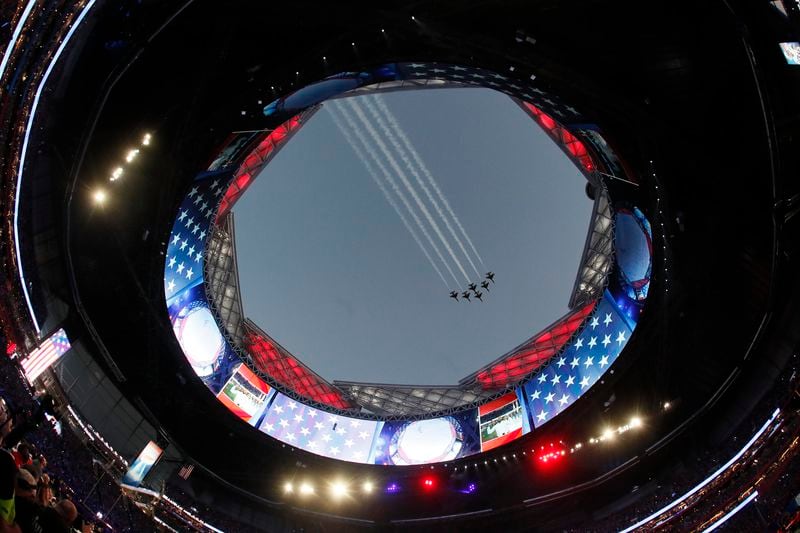 Military jets flyover before the New England Patriots play the Los Angeles Rams in Super Bowl LIII on Sunday, Feb. 3, 2019 at Mercedes-Benz Stadium in Atlanta, Ga. (Bob Andres / bandres@ajc.com)
