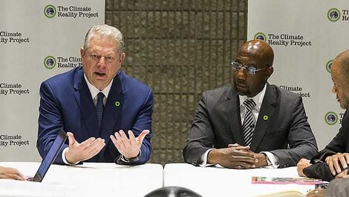 Former Vice President Al Gore and Atlanta's Ebenezer Baptist Church pastor, Reverend Raphael G. Warnock, speak with members of the media at a round table discussion during the Climate Reality Leadership Corps at Georgia World Congress Center in Atlanta.