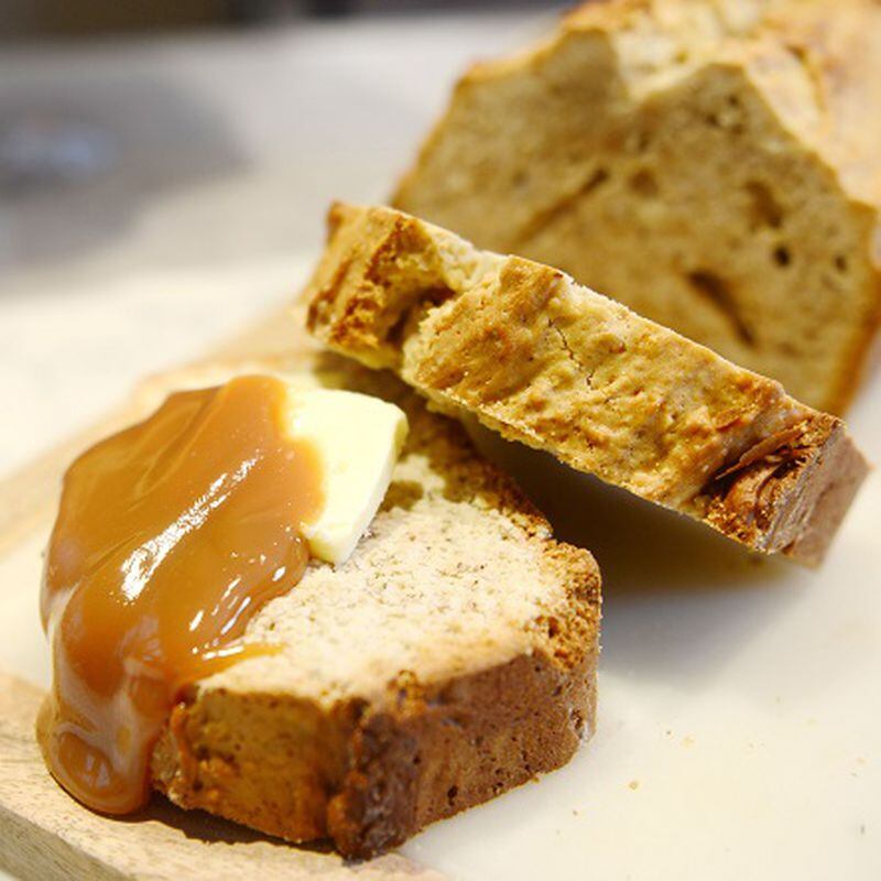 Dulce de leche spread over Torta de Nuez, or nut bread. (Nate Guidry/Pittsburgh Post-Gazette/TNS)