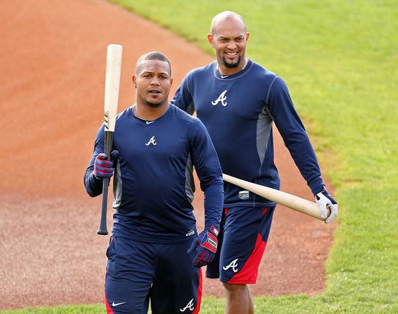 The Braves don't seems to have much purpose for utility player Emilio Bonifacio (right), pictured here with shortstop Erick Aybar. (Curtis Compton/AJC photo)