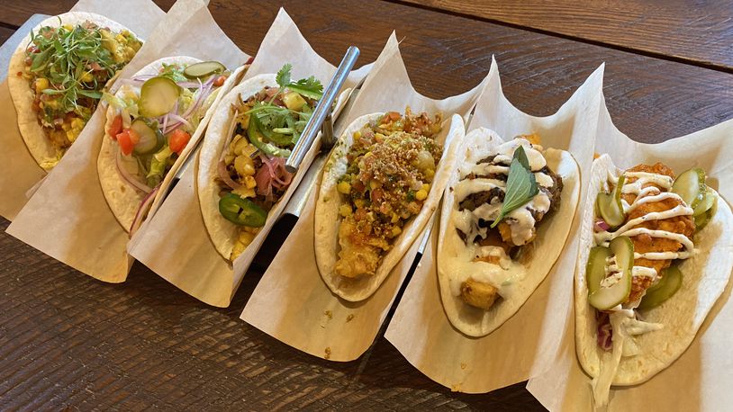 Velvet Taco offers more than 20 tacos that feature flavor combinations inspired by international cuisines. (Ligaya Figueras / ligaya.figueras@ajc.com)