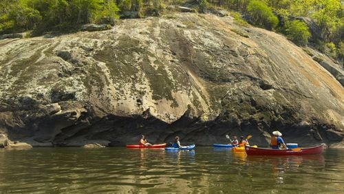 The 280-mile Coosa River affords plenty of places for canoeing and kayaking. These boaters on the Coosa are downstream from the Jordan Dam. CONTRIBUTED BY: Alabama Tourism Department