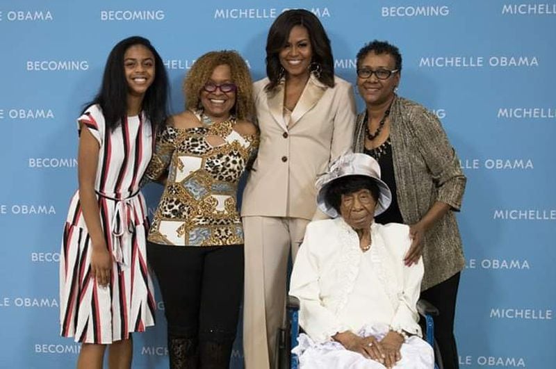 Willie Mae Hardy, 111, and Michelle Obama, pictured with Hardy's family.  (Credit: Tonya Edwards)