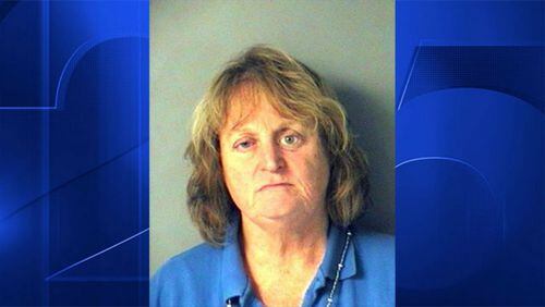 Nancy Bucciarelli was arrested and charged with animal cruelty after pushing a golden retriever off a dock and letting it drown in a lake, police said. (Photo: Boston25News.com)