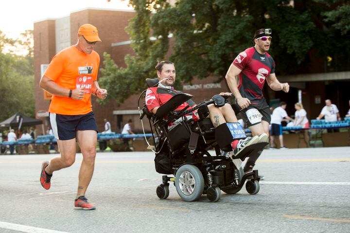 Photos: Toughing it out at the AJC Peachtree Road Race