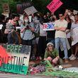 Protesters against Israel's war in Gaza gathered at the Arch at the entrance of the University of Georgia campus and then marched to city hall during a rally in Athens on Friday May 3, 2024. (Nell Carroll for The Atlanta Journal-Constitution)