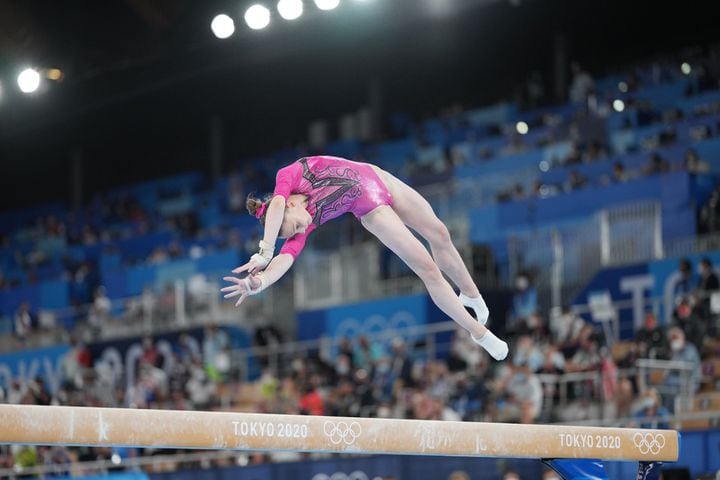 Vladislava Urazova of the Russian Olympic Committee performs on the balance beam during the women's all-around gymnastics competition at the postponed 2020 Tokyo Olympics in Tokyo on Thursday, July 29, 2021. (Doug Mills/The New York Times)