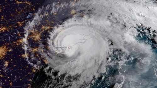 A satellite image shows Hurricane Florence lashing the Carolinas in September 2018.