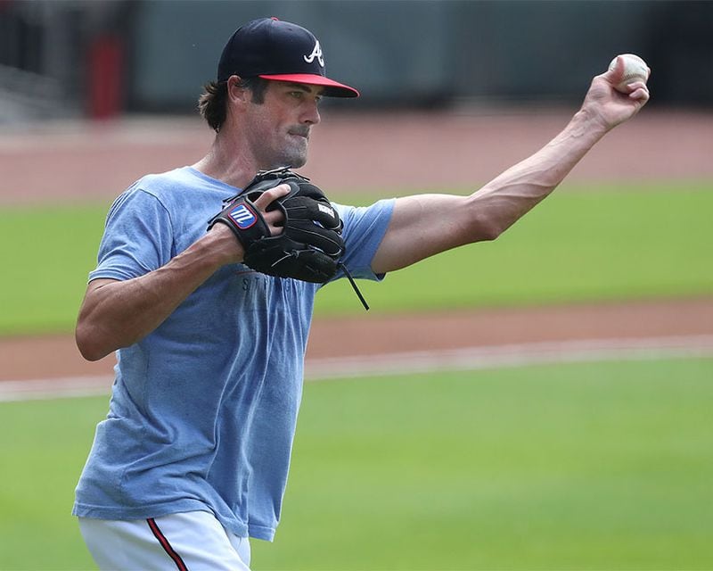 Braves pitcher Cole Hamels gets in some work from the mound running drills during the first workout of summer Friday July 3, 2020, at Truist Park in Atlanta.