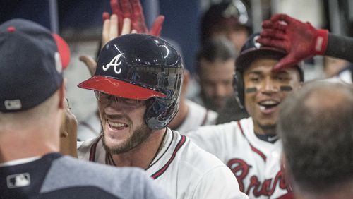 Tyler Flowers is having a career-best season for the Braves and part of a catching duo that ranks among the major league leaders in most major offensive categories. (AP Photo/John Amis)
