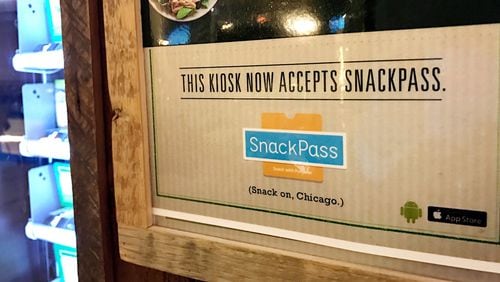 The SnackPass app works with a Farmer’s Fridge kiosk in The Shops at North Bridge on the Magnificent Mile on Tuesday, November 29, 2016. (Keri Wiginton/Chicago Tribune/TNS)