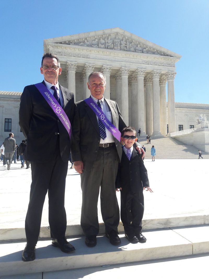 Daniel Madison “Mat” Davis (left), his father-in-law, Daniel Jones, and his 5-year-old son, Joshua Davis, stopped at the Supreme Court during a visit to Washington, D.C., to lobby Congress for more funding for Alzheimer’s research. CONTRIBUTED BY TAMMY DAVIS
