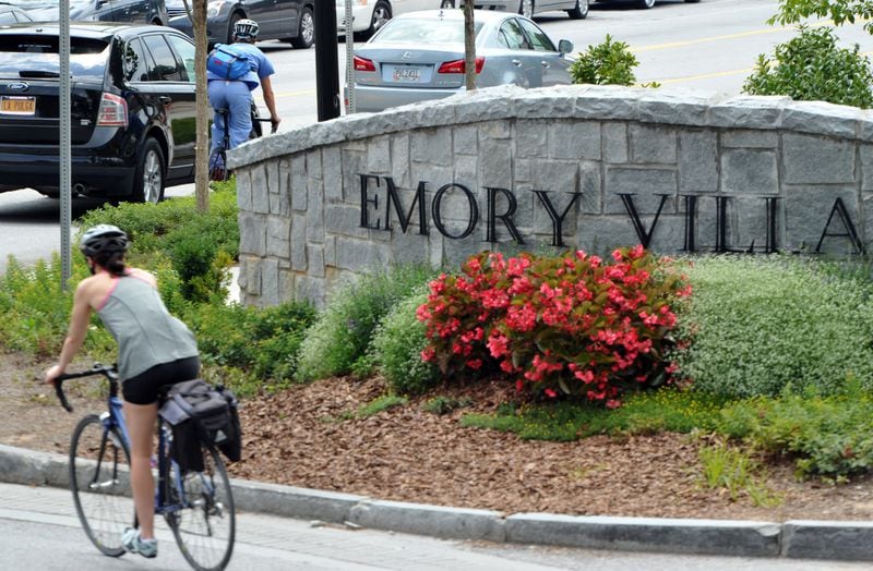 A traffic circle, and shops and restaurants in Emory Village near an entrance to Emory University in Atlanta on Thursday, July 31, 2014. HYOSUB SHIN / HSHIN@AJC.COM