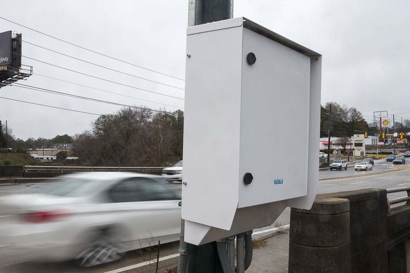 12/23/2019 — Atlanta, Georgia — A Road Weather Information System sensor is mounted on a pole along North Druid Hills Road NE in Atlanta, Monday, December 23, 2019. The city of Brookhaven is, to its knowledge, the first government to partner with Georgia DOT to install a Road Weather Information System sensor. The device, installed at the intersection of Buford Highway and North Druid Hills Road, can provide real-time data on weather factors including pavement conditions, precipitation amounts and visibility. (ALYSSA POINTER/ALYSSA.POINTER@AJC.COM)