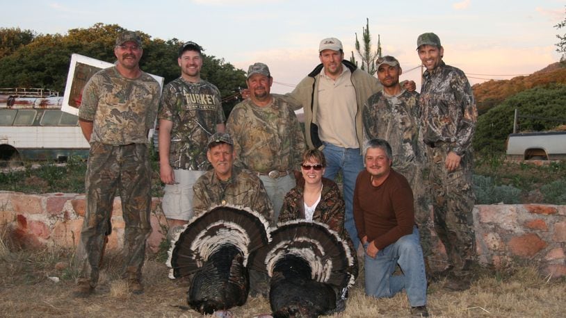 A photo from a 2010 hunt for Gould's wild turkeys in Zacatecas, Mexico, includes Gary Green, front left with bird, Howard Wohlgefardt, far left, and Paul A. Smith, far right. (Paul A. Smith/Milwaukee Journal Sentinel/TNS)