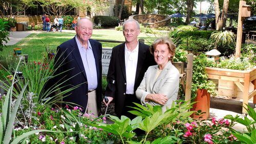 From left, Harold Shepherd, his son James, whose injury helped spark the founding of the Shepherd Center, and Alana Shepherd outside the center. (credit: Shepherd family photo)