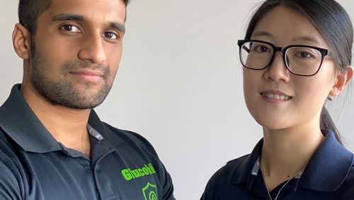 Georgia Tech grads Vedant Pradeep, left, and Ziyi Gao, right, met in a chemical engineering class and became partners in app development, including a promising new one designed to help people quit drinking.