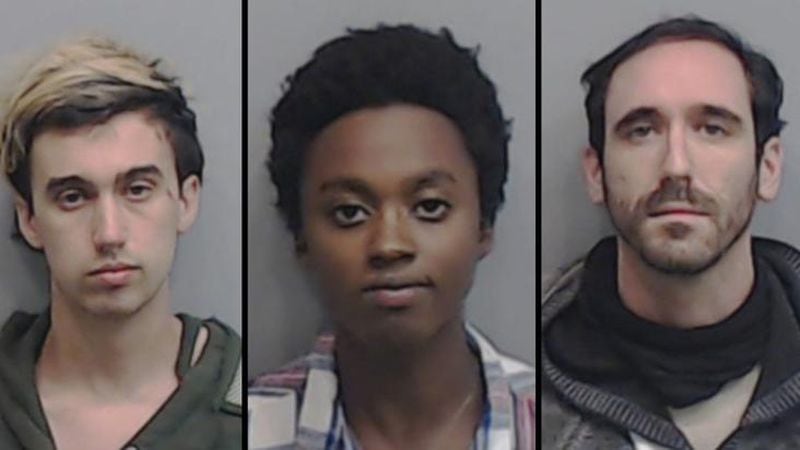 (from left) Jacob David Wilson, Andrew Xavier Monden and Vincent Castillenti were arrested and charged for participating in a protest at Georgia Tech that left two campus officers injured and a police vehicle burned.