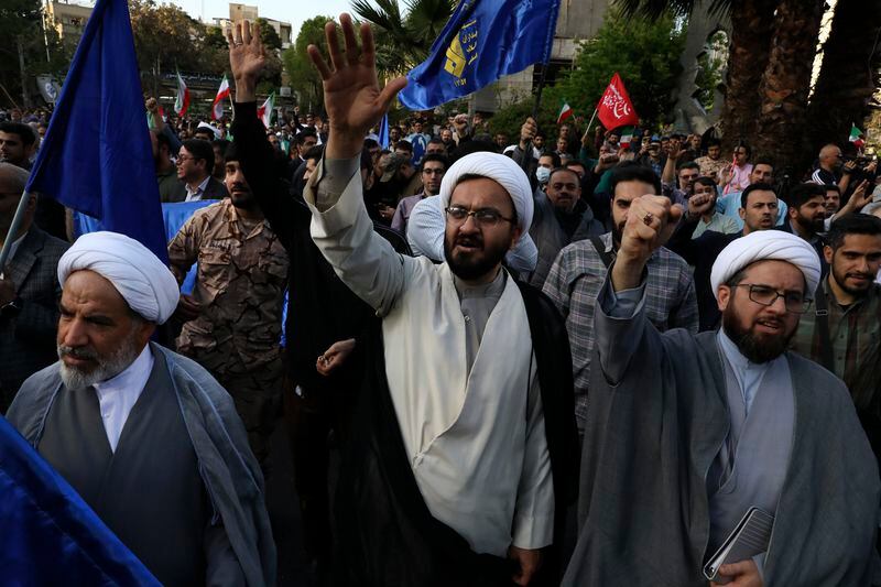 Iranian demonstrators chant slogans during their anti-Israeli gathering at the Felestin (Palestine) Sq. in Tehran, Iran, Monday, April 15, 2024. World leaders are urging Israel not to retaliate after Iran launched an attack involving hundreds of drones, ballistic missiles and cruise missiles. (AP Photo/Vahid Salemi)