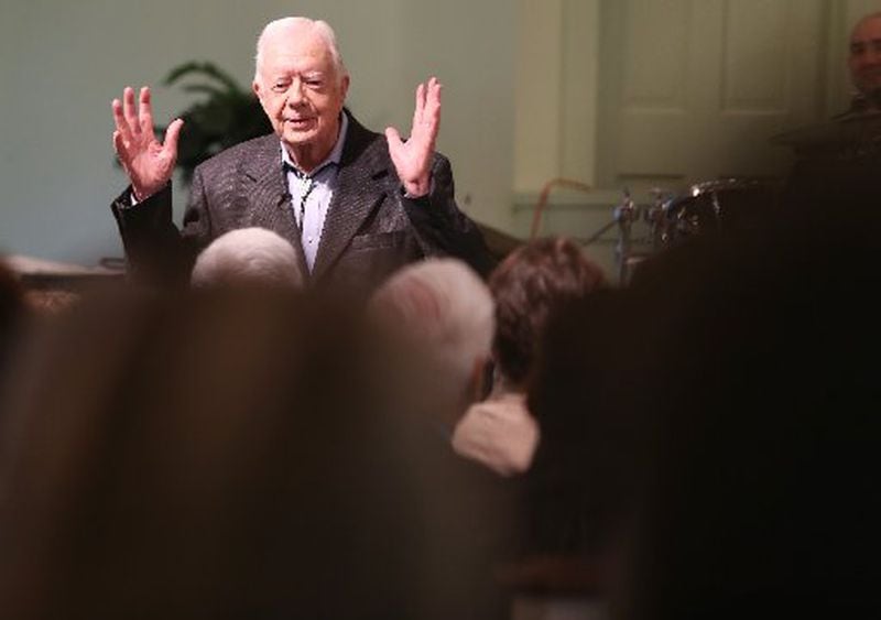 President Jimmy Carter talks to the overflow crowd at Maranatha Baptist Church in Plains on Sunday morning August 23, 2015 before teaching Sunday school. Ben Gray / bgray@ajc.com