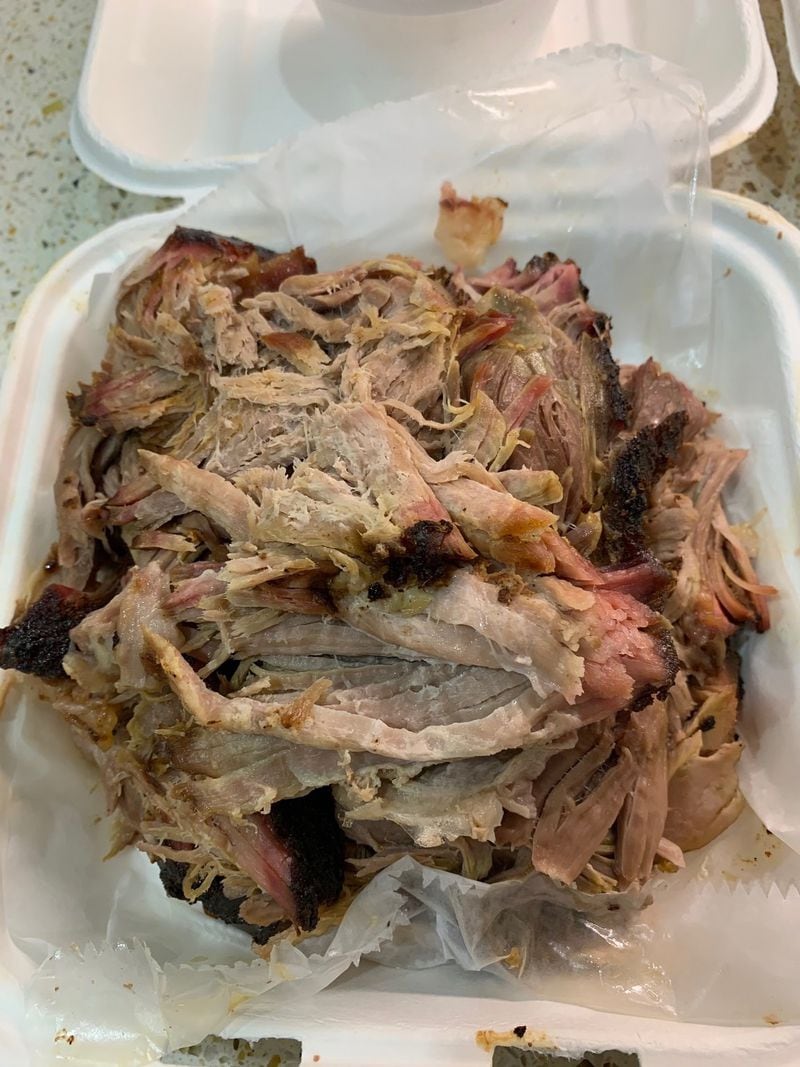 The pulled pork from Decatur’s Community Q is a highlight of the King family’s Fourth of July meal. CONTRIBUTED BY OLIVIA KING