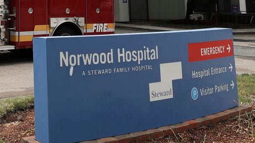 FILE - The sign for Norwood Hospital, a Steward Health Care hospital, is seen, June 29, 2020, in Norwood, Mass. Steward Health Care said it plans to sell off all its hospitals after announcing on Monday, May 6, 2024, that it filed for bankruptcy protection. (AP Photo/Steven Senne, File)