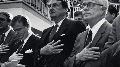 Steve Reynolds (far right)  attends opening ceremonies of Gwinnett Place Mall in February 1984. FILE PHOTO