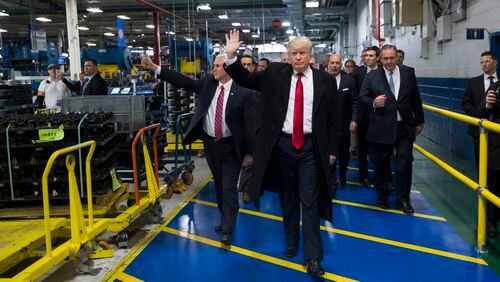 President-elect Donald Trump and Vice President-elect Mike Pence tour a Carrier plant in Indianapolis, Dec. 1, 2016. Trump appeared with workers at the plant to tell of his success in saving at least 1,000 jobs from moving to Mexico. (Doug Mills/The New York Times)