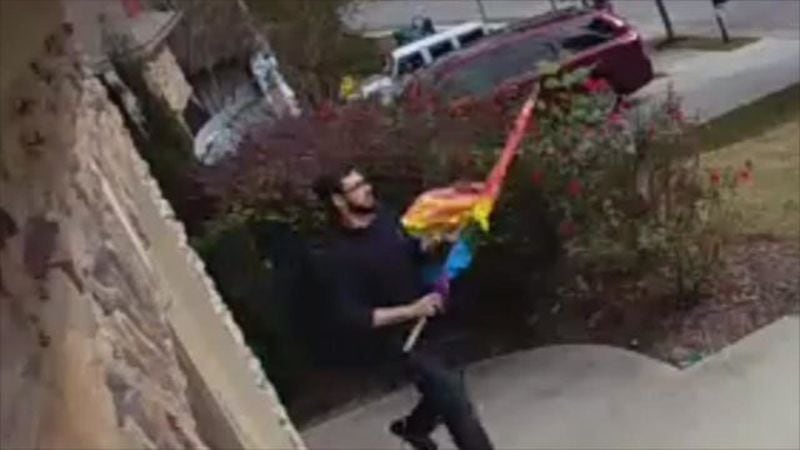 <p style="margin:0in 0in 8pt">Video shows a man calmly strolling up a driveway on Sunday morning and then pulling down a resident&#39;s Pride flag -- pole and all.</p>