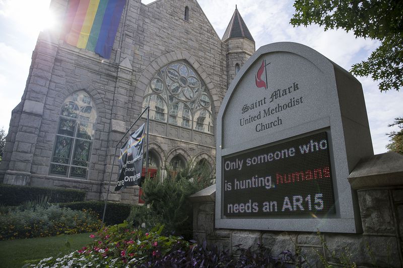 The St. Marks United Methodist Church sign displays a message regarding the recent mass shootings in El Paso and Dayton outside of its campus in Atlanta's Midtown community, Tuesday, August 6, 2019.  